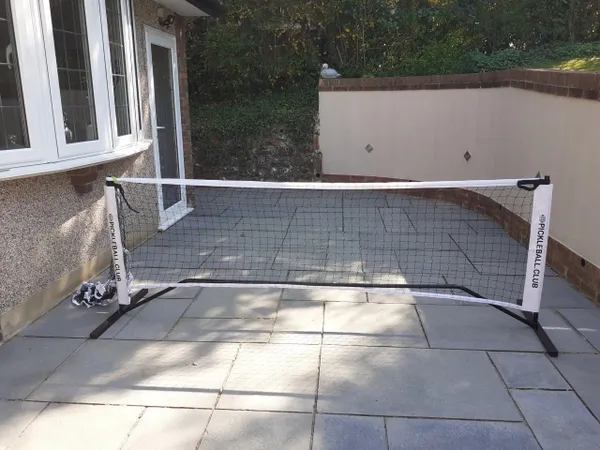 Système de filet pour club de pickleball
